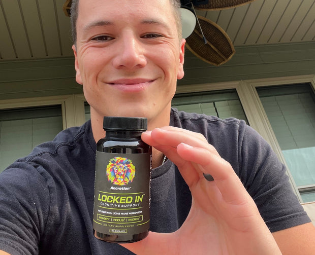 a_man_showing_locked_in_product_in_hand